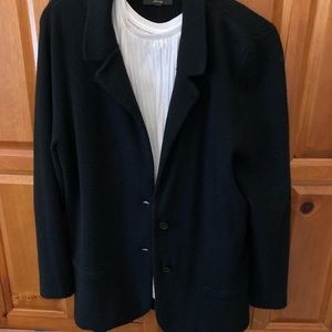 100% class act . Timeless blazer every closet should have .